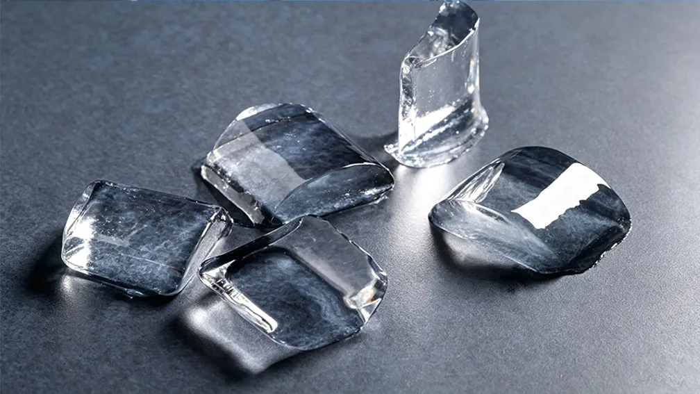 Crystal clear octagonal and crescent ice cube shapes for commercial bars