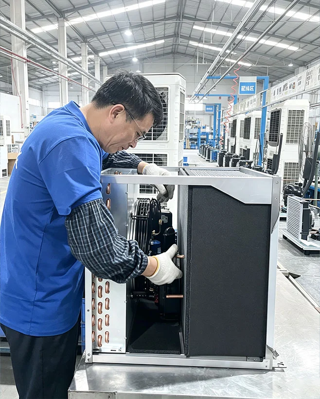 Commercial ice maker being assembled
